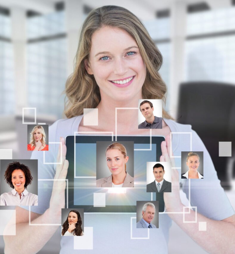 smiling-businesswoman-showing-her-tablet-with-virtual-app